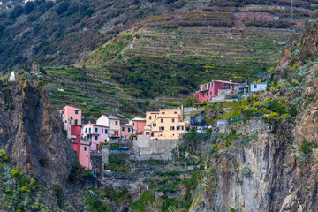 Naklejka premium Cinqueterre, Italy . 04-19-2019. View of Riomaggiore village one of five villages of Cinqueterre. Liguria. Italy. 