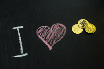 I love Bitcoin written on chalkboard, close-up