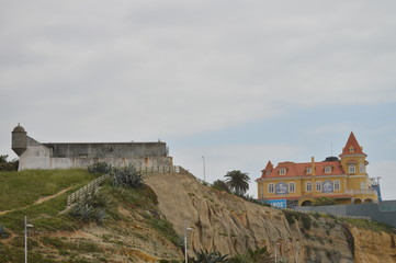 April 15, 2014. Estoril, Cascais, Sintra, Lisbon, Portugal. Fort San Teodosio Of Cavadeira and A Beautiful Palace On The Estoril Coast. Travel, Nature, Landscape.