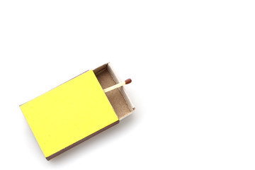 Matches made of natural wood yellow box, on a white background.