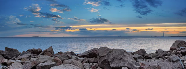 Fotobehang Rocky shore of the Gulf of Finland in St. Petersburg © parsadanov
