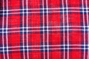 Red dark blue checkered shirt cloth background