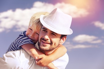Family happy outside sunset vacation lifestyle hug