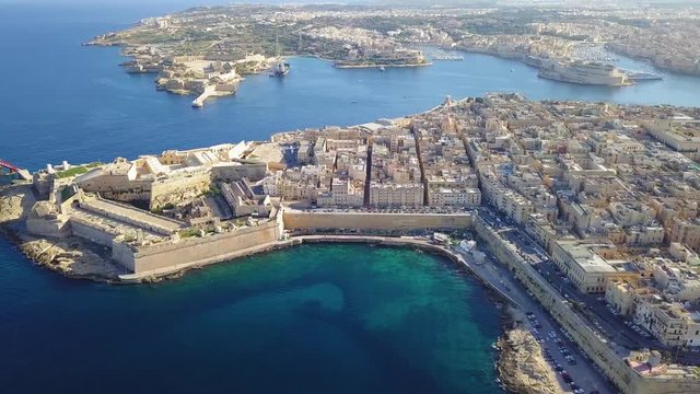 Sunny Winter Day above Valletta and Sliema, Malta Valletta is the capital city of Malta. Located in the south-east of the island, between Marsamxett Harbour to the west and the Grand Harbour to the ea