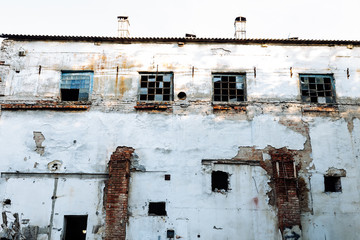 Destroyed building in summer, war