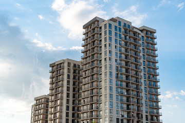 new multi-family houses against the blue sky