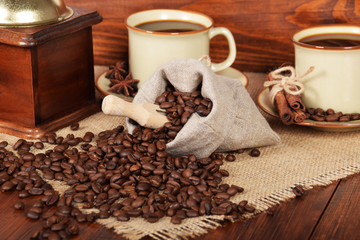 coffee in cups and roasted coffee grains