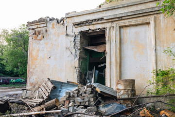 Fototapeta na wymiar Entrance to the destroyed building, war