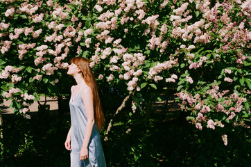 Atmospheric portrait among spring blossom.