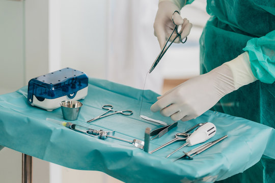 Dentist ordering his tools before operation