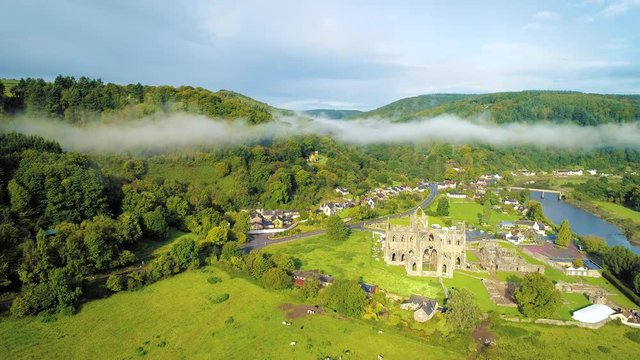 Aerial drone footage of the ruins Tintern Abbey, located on the Welsh boarders. 