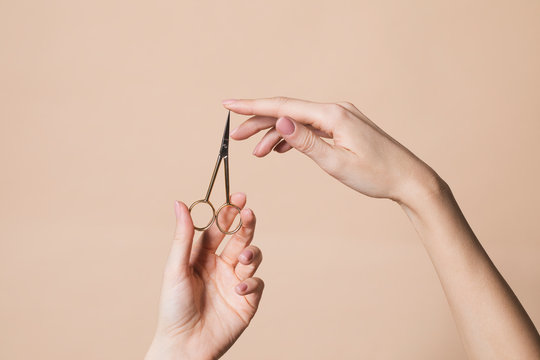 Woman Holding Nail Scissors