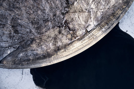 Aerial top view dike in winter