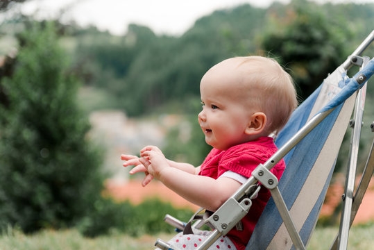baby in pushchair