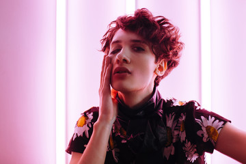 Portrait of beautiful male model with makeup