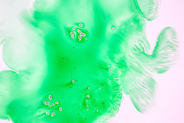 Watercolor and acrylic abstract. Colorful background. Mix, splashes and drawings of colors: green, white background