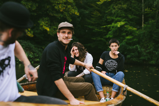 Group of friends in rowing boat