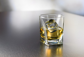glass of whiskey on the table