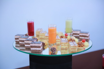 cake buffet and orange juice