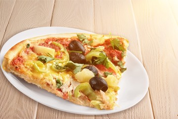 Delicious pizza on plate, close up