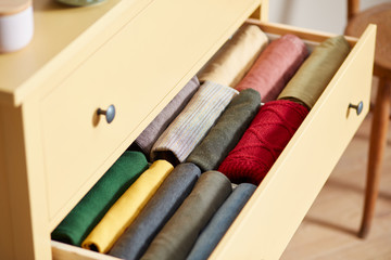 Close-up of decluttered clothes in drawer.