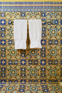 close-up of clothes drying on white wall