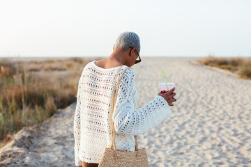Latin woman on the beach.