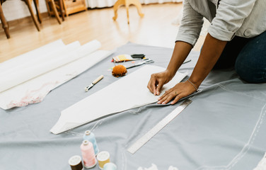 Fashion Designer woman working in her tailor shop, Tailoring, close up. Tailor Made and Small...