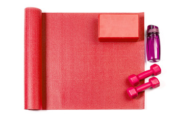 Yoga mat and dumbbells