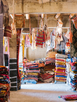 Colorful rugs for sale in shop