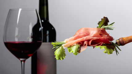 Prosciutto with rosemary.