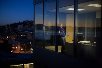Female executive working late.