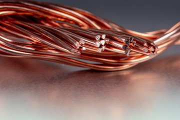 Copper wire on metallic surface - obrazy, fototapety, plakaty