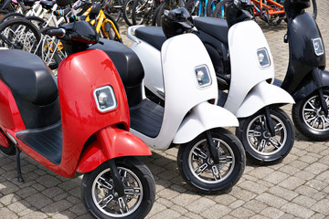 Electric scooters for rent in parking