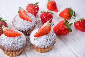 strawberry muffins sprinkled with white powder, cooking