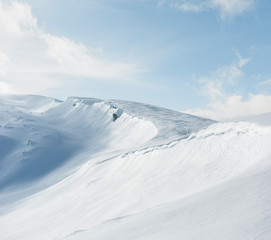 Snow covered mountain ridge