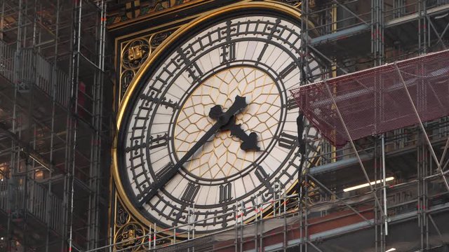 Close up footage of Big Ben's big clock under renovation.