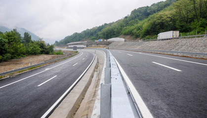 Modern highway safety markings on tarmac