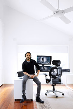 portrait of a man in home office