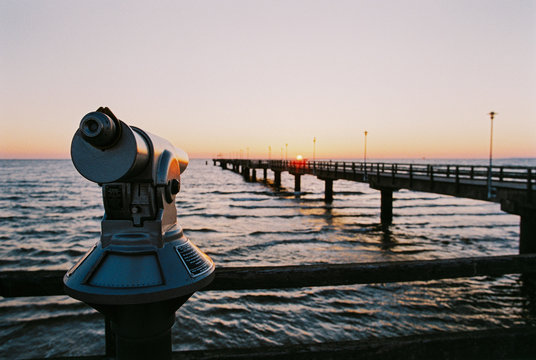 Binoculars Looking Out at Rising Sun Shot on Film