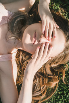 Woman laying with her eyes closed