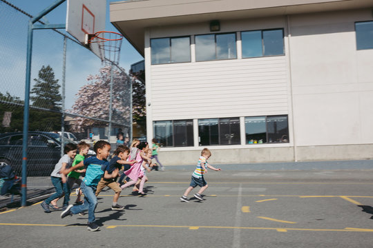 Running preschool kids outside