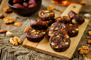 Dates and nuts roll. Indian sweets. Khajoor Katri