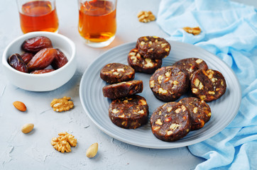 Dates and nuts roll. Indian sweets. Khajoor Katri
