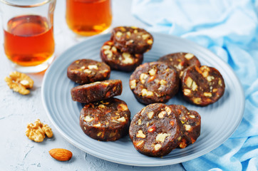 Dates and nuts roll. Indian sweets. Khajoor Katri