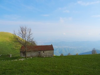 Fototapeta premium The Italian Alps at sunset near the Po valley and the village of Roncola, Italy - May 2019.