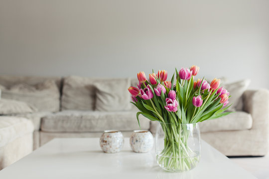 Colorful bouquet of tulips in a glass vase