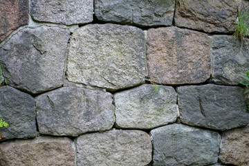 old stone boulder wall granite