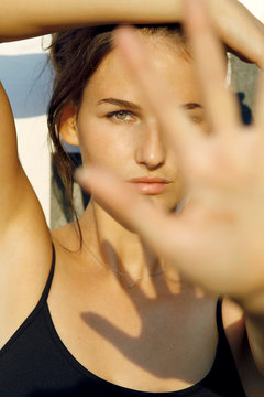 young woman making STOP sign