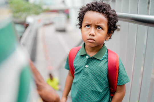 Little boy angry at his father